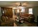 Inviting living space with modern flooring, warm tones, and comfortable seating arrangement at 1720 Valley Ln, Cumming, GA 30040