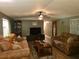 Comfortable living room with plush sofas, providing a cozy space for relaxation and entertainment at 1720 Valley Ln, Cumming, GA 30040
