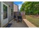 Comfortable seating on a backyard patio, ideal for enjoying outdoor living and relaxation at 255 Skipjack Ct, Covington, GA 30016