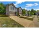 Attractive townhome with a well-maintained lawn and private driveway at 255 Skipjack Ct, Covington, GA 30016