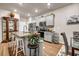 Well-equipped kitchen with modern appliances and granite countertops at 255 Skipjack Ct, Covington, GA 30016