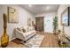 Cozy living room featuring contemporary decor and natural light at 255 Skipjack Ct, Covington, GA 30016