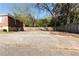 Expansive backyard with ample space for outdoor activities, complemented by a sturdy wooden fence for privacy at 2576 Flat Shoals Dr, Decatur, GA 30034
