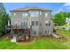 Charming home exterior with a deck, patio and meticulously landscaped backyard at 3810 Sweat Creek Run, Marietta, GA 30062