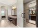 Bathroom featuring granite vanity with a chair and a glass-enclosed walk-in shower at 3810 Sweat Creek Run, Marietta, GA 30062