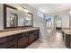 Bathroom with a large vanity with granite countertop and a soaking tub at 3810 Sweat Creek Run, Marietta, GA 30062