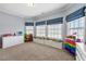 Bright bedroom filled with natural light, showcases ample space and storage solutions for organization at 3810 Sweat Creek Run, Marietta, GA 30062