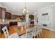 A well-appointed kitchen and dining area with modern appliances and stylish decor create an inviting space at 3810 Sweat Creek Run, Marietta, GA 30062