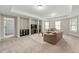 Spacious living room with plush seating, perfect for relaxing and entertaining in a comfortable setting at 3810 Sweat Creek Run, Marietta, GA 30062