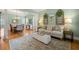 Bright living room with soft green walls, decorative accents, and a comfortable seating arrangement at 3810 Sweat Creek Run, Marietta, GA 30062