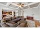 Inviting living room with coffered ceilings, hardwood floors, and seamless flow to a modern kitchen at 3810 Sweat Creek Run, Marietta, GA 30062