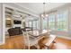Inviting living room next to the kitchen and dining area featuring a coffered ceiling and fireplace at 3810 Sweat Creek Run, Marietta, GA 30062