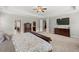 Spacious main bedroom featuring tray ceiling, windows, neutral colors and carpet at 3810 Sweat Creek Run, Marietta, GA 30062