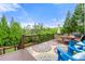 Inviting outdoor deck with comfortable seating, a dining area, and views, creating a relaxed and enjoyable space at 3810 Sweat Creek Run, Marietta, GA 30062