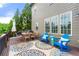 Charming outdoor deck, furnished with a dining table and inviting seating, perfect for relaxing outdoors at 3810 Sweat Creek Run, Marietta, GA 30062