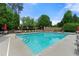 Community swimming pool with ample seating for relaxation and summer fun at 3810 Sweat Creek Run, Marietta, GA 30062