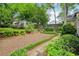 Spacious backyard with detached guest house and lush landscaping at 25 Standish Nw Ave, Atlanta, GA 30309