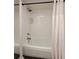 Bathroom featuring a tub with white subway tiles and a shower head at 25 Standish Nw Ave, Atlanta, GA 30309