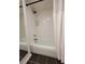 Bathroom featuring a tub with white subway tiles and a shower head at 25 Standish Nw Ave, Atlanta, GA 30309