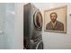 Modern laundry room features a stacked washer and dryer set at 25 Standish Nw Ave, Atlanta, GA 30309