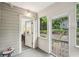 Charming porch with view into sunroom and backyard landscape at 25 Standish Nw Ave, Atlanta, GA 30309