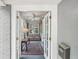 Inviting sunroom with French doors, ceiling fan, and charming seating area with rug at 25 Standish Nw Ave, Atlanta, GA 30309
