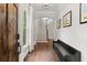 Inviting foyer with dark hardwood floors, staircase and accent wall decor at 3668 Spring St, Chamblee, GA 30341