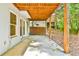 Exterior view of covered back patio with a wood ceiling at 3688 E Bay St, Duluth, GA 30096