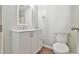 Updated bathroom with modern vanity, fixtures, and commode at 3688 E Bay St, Duluth, GA 30096