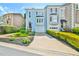 Charming townhome with attached garage, landscaped front yard, and welcoming curb appeal at 3688 E Bay St, Duluth, GA 30096
