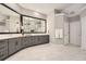 A spacious bathroom featuring double vanity sinks, modern fixtures, and neutral tones at 3801 Bays Ferry Trl, Marietta, GA 30062
