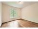 Cozy bedroom with hardwood floors, natural light, and neutral wall colors at 3801 Bays Ferry Trl, Marietta, GA 30062
