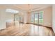 Elegant dining room featuring hardwood floors, tray ceilings, and abundant natural light at 3801 Bays Ferry Trl, Marietta, GA 30062