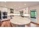 Stylish kitchen with a marble island, stainless steel appliances, and custom cabinetry at 3801 Bays Ferry Trl, Marietta, GA 30062