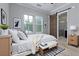 Well-decorated bedroom with natural light and access to the bathroom at 569 Mirrormont Se Dr, Smyrna, GA 30080
