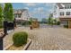 Gated community entrance with stone accents and well-maintained landscaping, offering security and curb appeal at 569 Mirrormont Se Dr, Smyrna, GA 30080