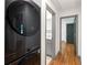 Hallway with laundry area and access to updated bathroom at 3471 Elgin Dr, Decatur, GA 30032