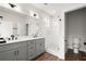 Bathroom with a gray vanity, shower, and toilet at 1122 W Marietta St, Atlanta, GA 30318