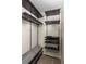 Organized walk-in closet with shelving and drawer storage system at 1378 Lochland Se Rd, Atlanta, GA 30316