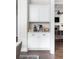 Convenient coffee bar nook with white cabinets, granite countertop, and modern appliances at 1378 Lochland Se Rd, Atlanta, GA 30316