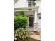 Inviting front porch with stylish tile, stone accents, and lush landscaping creating a welcoming entrance at 1378 Lochland Se Rd, Atlanta, GA 30316