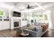 Cozy living room with fireplace, built-in cabinets, and ample natural light, ideal for relaxation at 1378 Lochland Se Rd, Atlanta, GA 30316