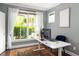 Bright home office with large windows, a modern desk, and stylish decor at 1378 Lochland Se Rd, Atlanta, GA 30316