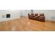Finished basement with hardwood floors, leather recliners, and built-in entertainment system at 2017 Harts Mill Ne Rd, Chamblee, GA 30341