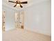 Bedroom with neutral carpet, white walls and trim, and two access doors to other rooms at 2017 Harts Mill Ne Rd, Chamblee, GA 30341