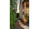 Well-manicured landscaping along the side of a brick home with a stone walkway at 2017 Harts Mill Ne Rd, Chamblee, GA 30341