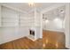 View of the spacious living room with built in shelving and fireplace at 2017 Harts Mill Ne Rd, Chamblee, GA 30341