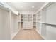 Spacious walk-in closet with custom shelving and ample storage space at 2017 Harts Mill Ne Rd, Chamblee, GA 30341