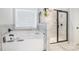 Modern bathroom featuring a soaking tub and glass-enclosed shower at 35 Henson Farm Dr, Loganville, GA 30052