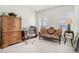 Comfortable bedroom with carpet floors, natural light, and traditional furnishings at 35 Henson Farm Dr, Loganville, GA 30052